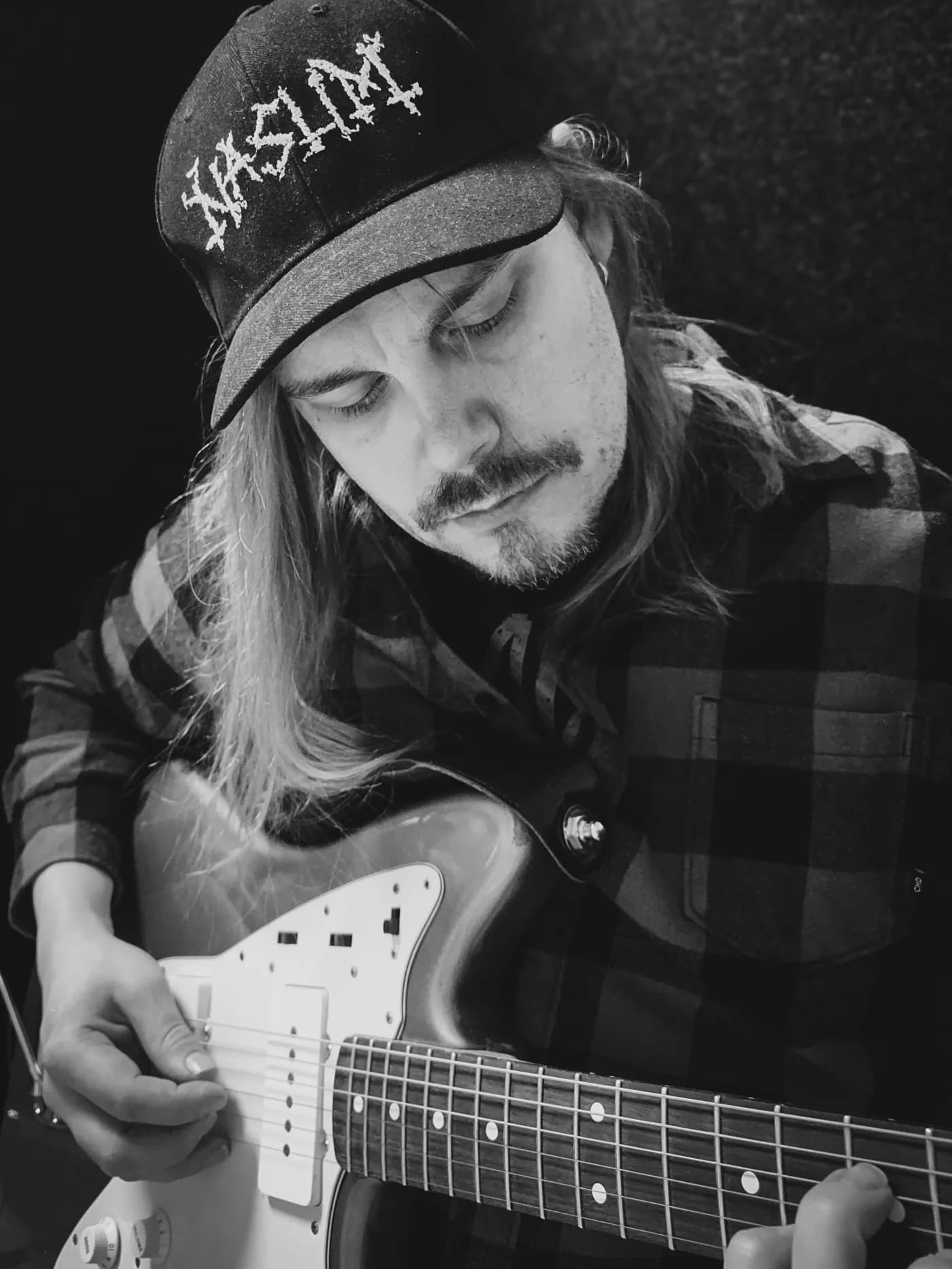 Smear Audio's Jani playing guitar